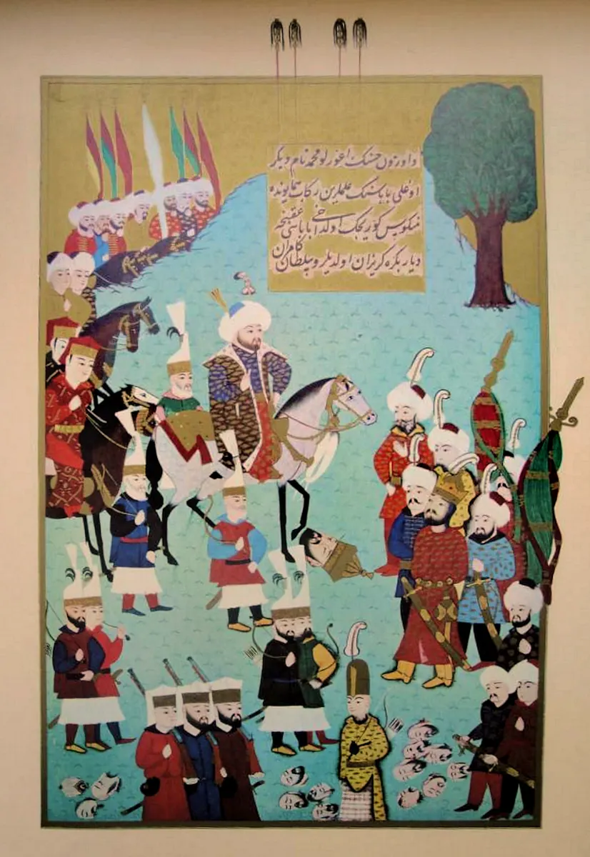 Uzun Hasan’ın oğlu Uğurlu Mehmed Bey’in babasının alemlerini Fatih’in huzurunda görmesi; IA taraması — Anafarta levha 30 — Hünernâme I minyatürü (Topkapı Sarayı Müzesi Kütüphanesi (tarama: Wikimedia Commons))